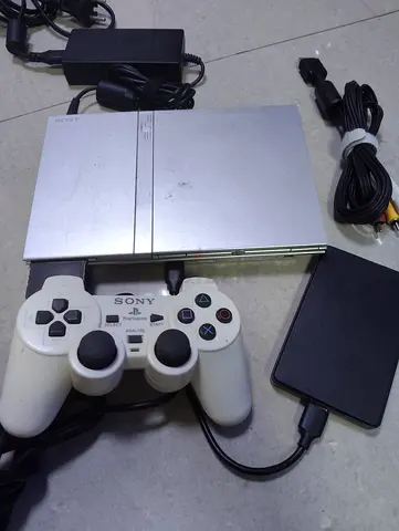 Ps2 slim with loaded 150+ games