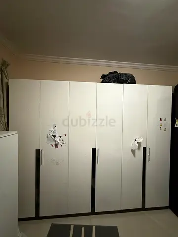 white 4-door wardrobe - good condition, some stickers