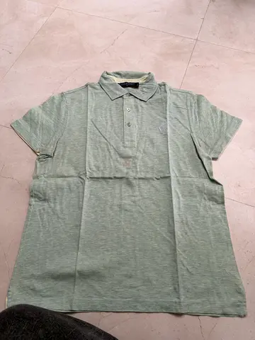 Light green men's polo shirt, size likely/L, casual wear riverwoods