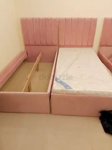 Pair of Pink Upholstered Single Beds with Storage