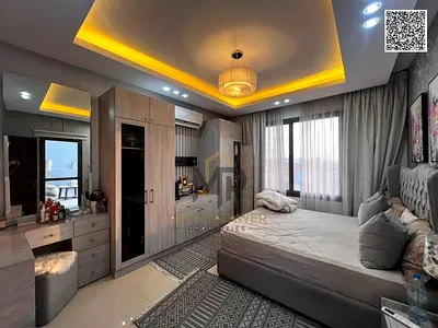 At a great price including electricity, water, air conditioning, and registration fees, a 5-bedroom townhouse with a roof terrace in Al Yasmin area. B