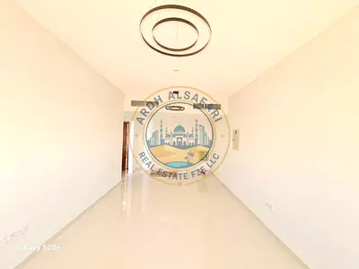 One month free Spacious 2BHK Apartment with all master bedrooms, Balcony, covered Parking in tilal city sharjah