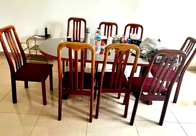 Wooden Dining Table with 8 Chairs - Good Condition