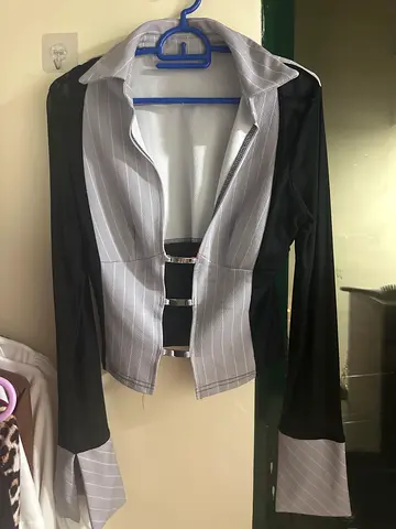 Grey pinstripe women's blazer with black sleeves, size medium,