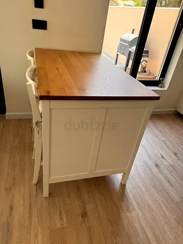 Modern Kitchen Island with Wood Top and White Base and two chairs