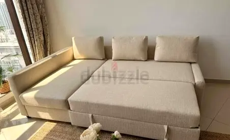 IKEA Comfortable L-Shaped Sofa Bed in Beige Fabric