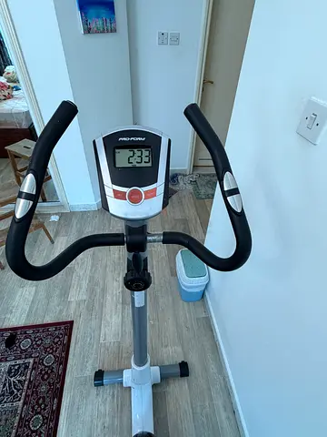 Used upright exercise bike with digital display - good working condition