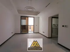 For rent in Al Jurf 3, Ajman: 1BR, balcony, 2 baths, central AC, first tenant, free maintenance, AED