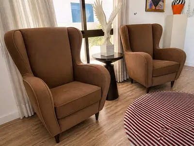 Two Arms Chairs From THE ONE