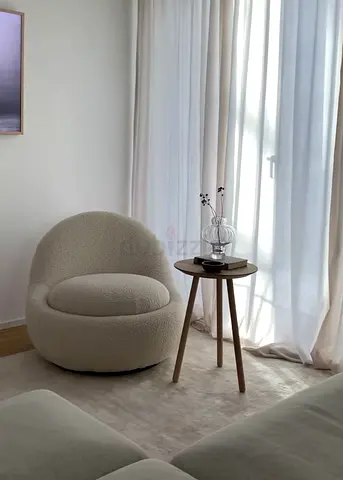 Cozy boucle accent chair in cream