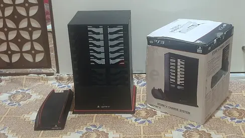PS3 vertical stand / charging system sailing in good condition.