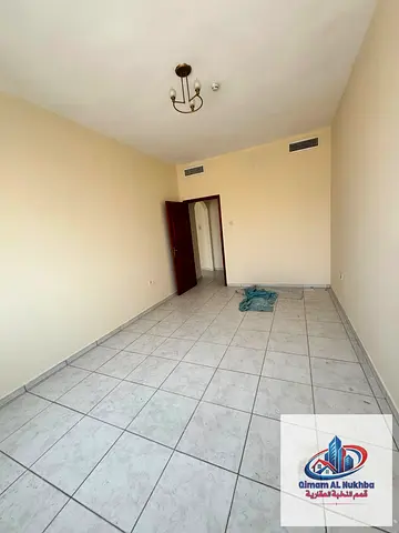 Largest one-bedroom apartment in Sharjah with free central air conditioning, spacious rooms.