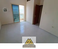 1BR in Al Rashidiya 2, balcony, central AC, family building, free maintenance, AED 26K, 6 payments.