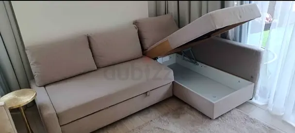 Light beige storage sofa bed - compact L shaped sofa bed-seater with pull-out and under-seat storage