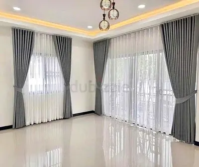 Light grey floor-to-ceiling curtains with sheer liners - set for living room
