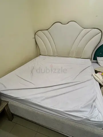 Comfortable Bed with Decorative Padded Headboard