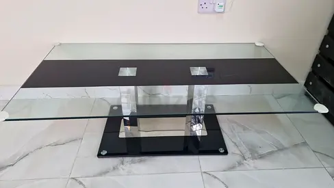 Glass Top Coffee Table with Black Base - Good Condition