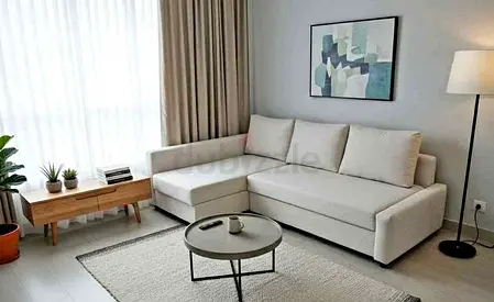 Light grey L-shaped fabric sofa bed with chaise - good condition