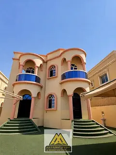 A luxurious villa with a distinctive family design, spacious areas, a swimming pool, a large setback