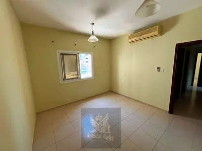 For rent in Sharjah one bedroom apartment with living room in a prime location in Al Qulaya annual rent AED 26000 payment in 4 installments deposit AE