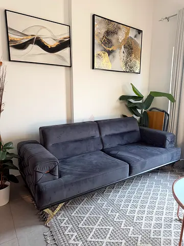 Comfortable 3-seater grey velvet sofa - good condition