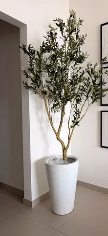 Tall artificial olive tree in white tall planter - ready to place