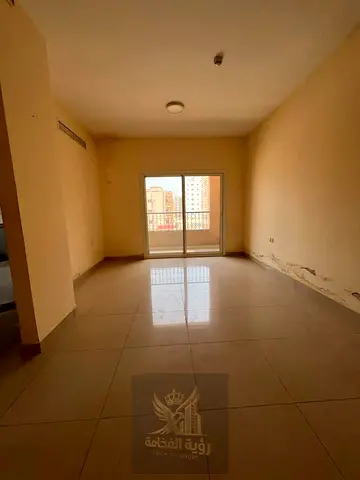One bedroom and living room in Al Butina with balcony bathroom and central AC Annual rent 28000 in 4 or 6 payments six month deferred deposit plus one