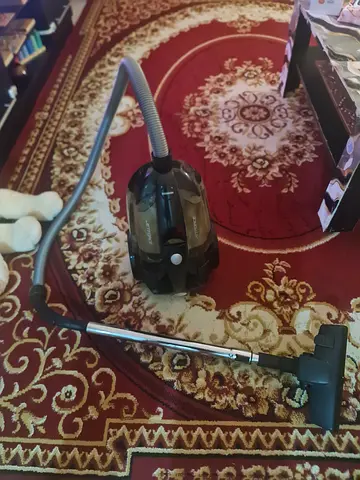 Used canister vacuum cleaner in very good condition