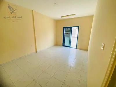 A one-bedroom apartment with a spacious living room, two bathrooms, a balcony, and a modern kitchen, in a prime location with flexible payment options