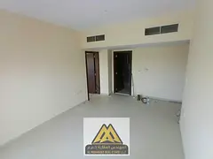 One-bedroom apartment with living room in Al Rawda 2, Ajman, two balconies, one bathroom, central AC
