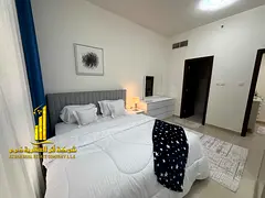 Luxury one-bedroom apartment in Ajman - Al Nuaimiya 1 - Al Shurooq Towers - furnished with hotel-sty