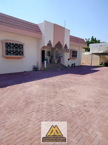 For annual rent: a large villa with 7 master bedrooms and a private annex in the Mushrif area, close to all services and main roads.