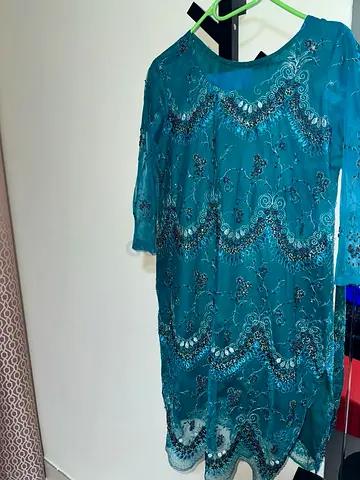 Teal embroidered knee-length women's dress, medium size with tulip trousers
