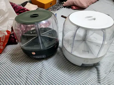 Pair of electric egg cookers/steamers - green and white, lightly used