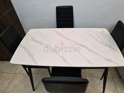 White Marble Effect Dining Table with four chairs