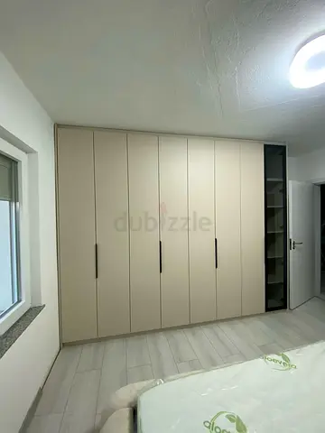 Large Beige Built-in Wardrobe / Armoire with Shelves