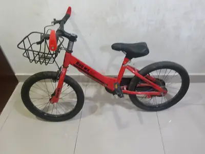 Red kids' 16-inch bicycle with front basket - used, good condition
