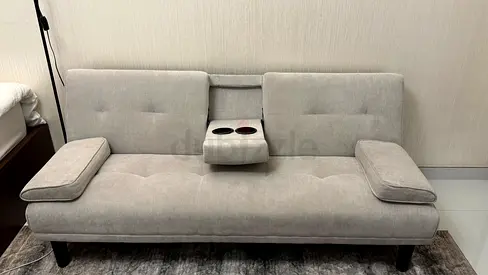 Light grey 3-seater convertible sofa with cup holders