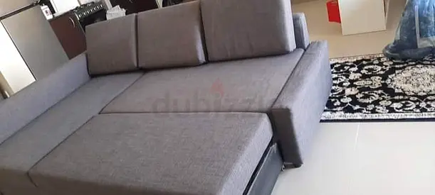 Grey L-shaped Sofa Bed with Storage - Good Condition