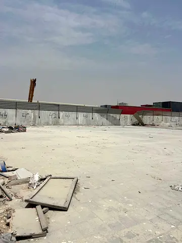 **20,000 Sq Ft Open Yard with 2 shops for Rent – Sajaa Industrial Area, Sharjah | AED 260,000/Year*
