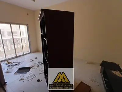 1BR in Al Rashidiya 1, separate hall, balcony, central AC, good space, AED 30K, 6 payments.