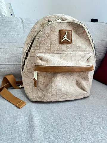 Beige Jordan mini backpack in good condition