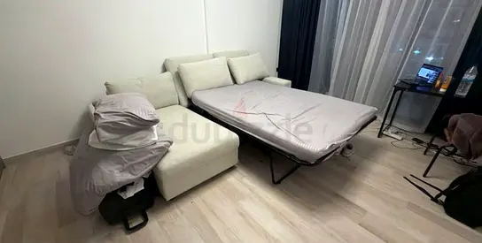 Convertible L-shaped Sofa with Pull-out Bed — Light Beige, Good Condition