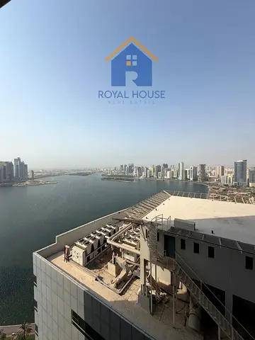 2BR apartment for sale in Al Majaz 2 with open Khalid Lagoon view, 1,300 sqft, parking, vacant, rea