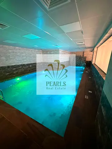 للإيجار السنوي بعجمان - غرفتين وصالة ومجلس في المويهات 3 قرب شارع المدارس | ثاني ساكن | جيم ومسبح | شهر مجاني | 42 ألف