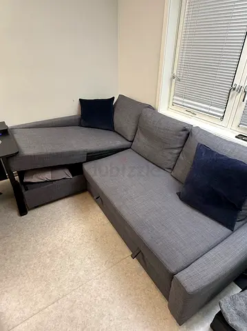 Grey L-shaped Sofa Bed with Storage - Good Condition