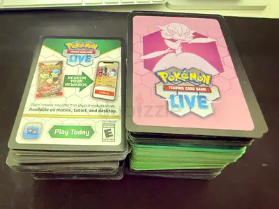 400 (approx) Pokemon Live code cards (plus free tin)