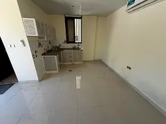 Spacious Studio Apartment - Second Building Directly on the Corniche - Split AC - Prime Location Clo