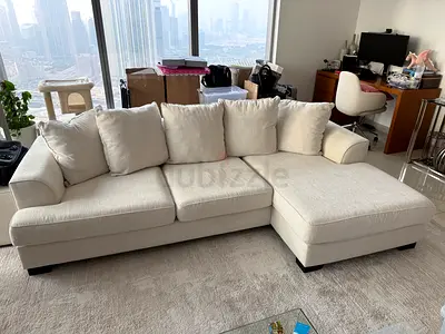The One Light beige L-shaped 3-seater sofa with chaise, good condition. Original price 8k.