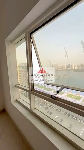 Three-bedroom apartment with a living room in Al Majaz 3, with a full sea view.